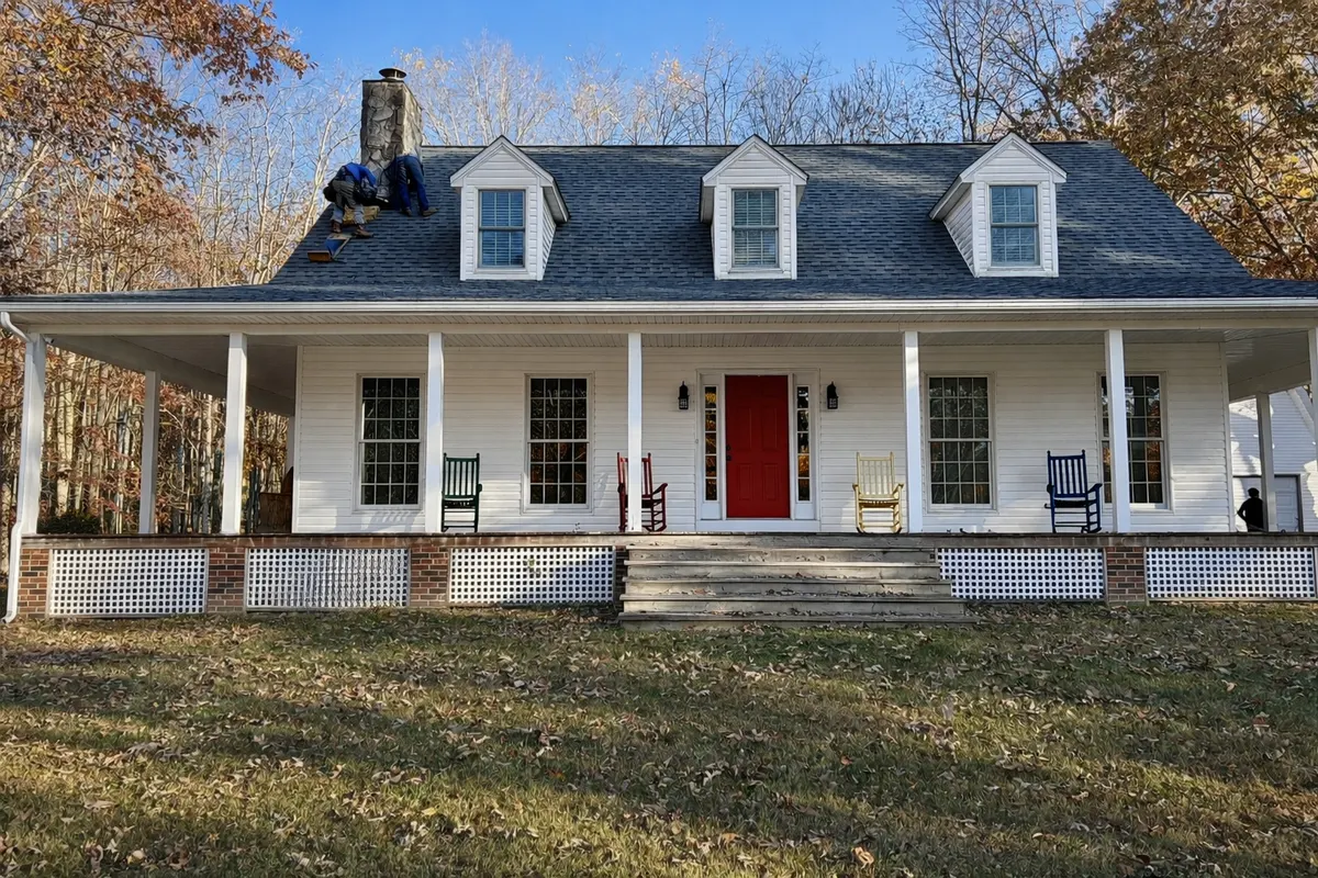 Shingle roof install on white home with dormers in West Virginia