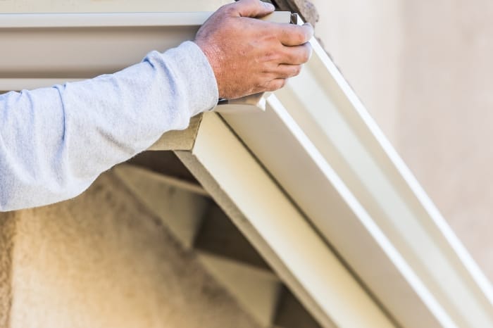 Seamless gutter installation on a West Virginia home